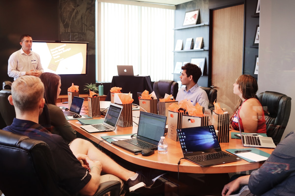 A team reviewing work together in a meeting room